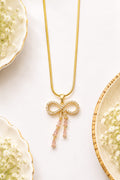 Gold-Plated Crystal Ribbon Bow & Pink Teardrop Cascade Pendant Necklace