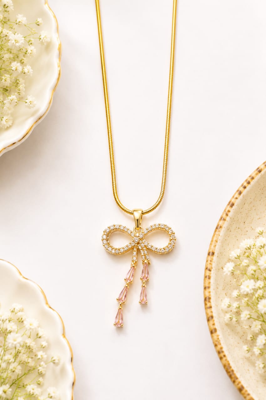 Gold-Plated Crystal Ribbon Bow & Pink Teardrop Cascade Pendant Necklace